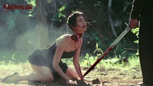 Bloodied Woman in Forest