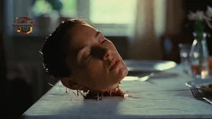 Decapitated Head on Table