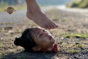 Foot on Severed Head