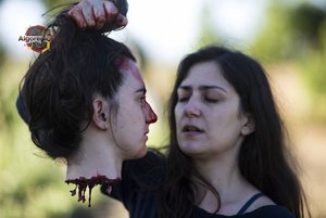 Holding Severed Head