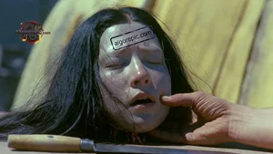 Severed Head on Table