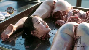 Decapitated Body on Table