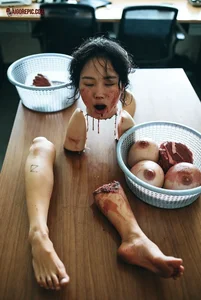 Dismembered Woman on Office Table