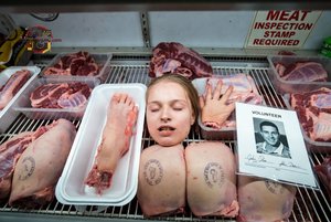 Meat Display with Volunteer