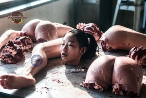 Woman Amidst Raw Meat