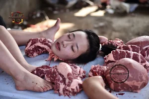 Woman Amidst Raw Meat