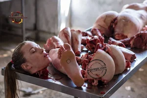 Woman Among Butcher Cuts