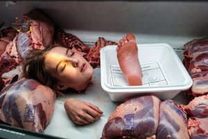 Woman in Meat Display