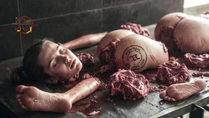 Woman in Meat Display