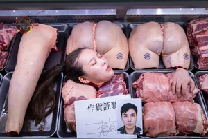 Woman in Meat Display