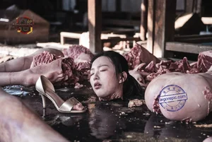 Woman in Meat Market