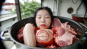 Woman in Meat Pot
