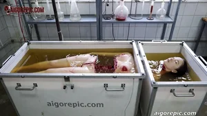 Women Submerged in Bloody Lab Tanks