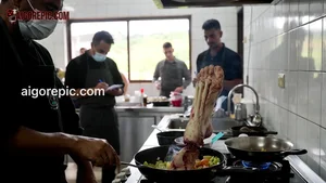 Chefs Preparing Bone in Kitchen