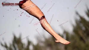 Severed Leg in Mid-Air