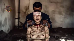 Bound and Bloodied Woman