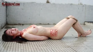 Bound Woman on Tiled Floor