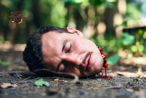 Decapitated Head in Forest