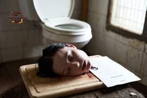 Decapitated Head on Cutting Board