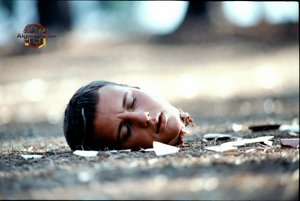 Decapitated Head on Ground