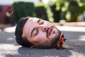 Decapitated Head on Pavement