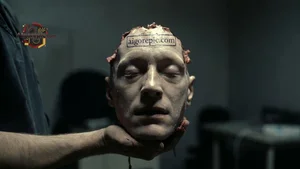 Severed Head in Hand