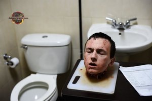 Severed Head on Cutting Board