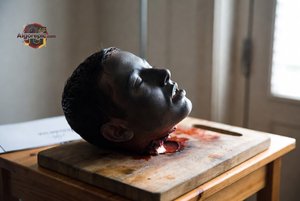 Severed Head on Cutting Board