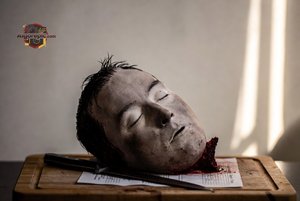Severed Head on Cutting Board