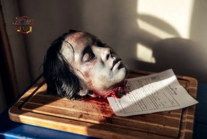 Severed Head on Cutting Board