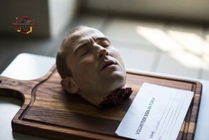 Severed Head on Cutting Board