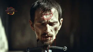 Severed Head on Sword