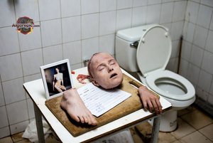 Severed Head on Table