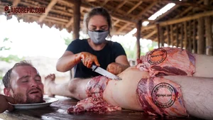 Graphic Butchering Scene