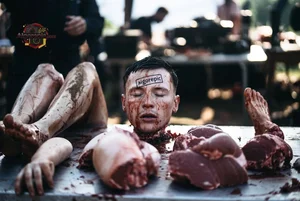 Man Covered in Blood and Meat