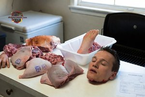 Man in Meat Display