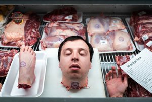 Man in Meat Display Case
