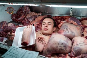 Man in Meat Display