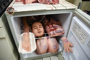 Man in Meat Fridge