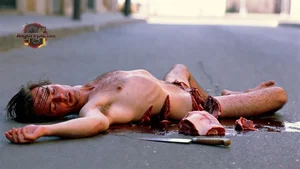 Man on Street with Knife