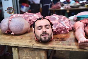 Man's Head in Meat Market