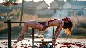 Bound Woman Over Fire