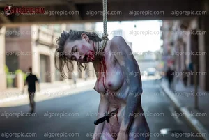 Hanging Woman in Urban Setting