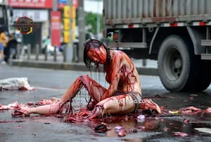 Woman Covered in Blood