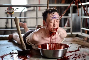 Bound Man in Blood Pool