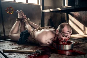 Bound Man in Blood Pool