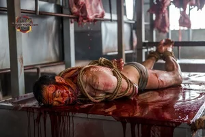 Bound Man in Slaughterhouse