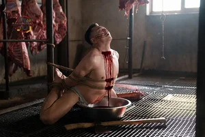 Bound Man in Slaughterhouse