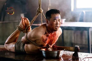 Bound Man in Torture Scene
