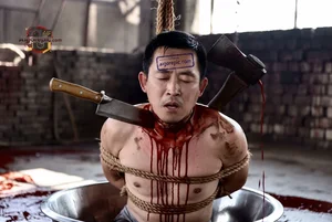 Bound Man with Knives